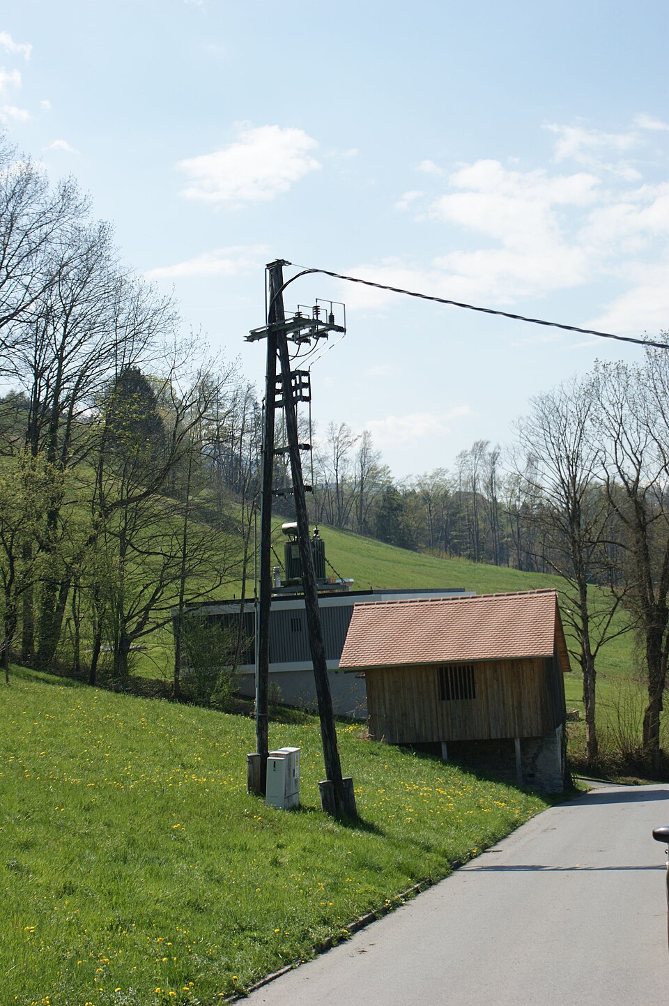 Pole-mounted MV/LV distribution transformer station in Dornbirn, Vorarlberg, Austria.