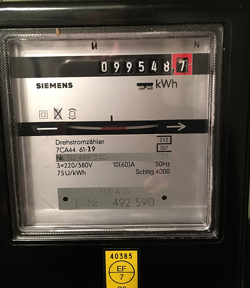 Front of a Siemens three-phase Ferraris (induction disc) electricity meter.