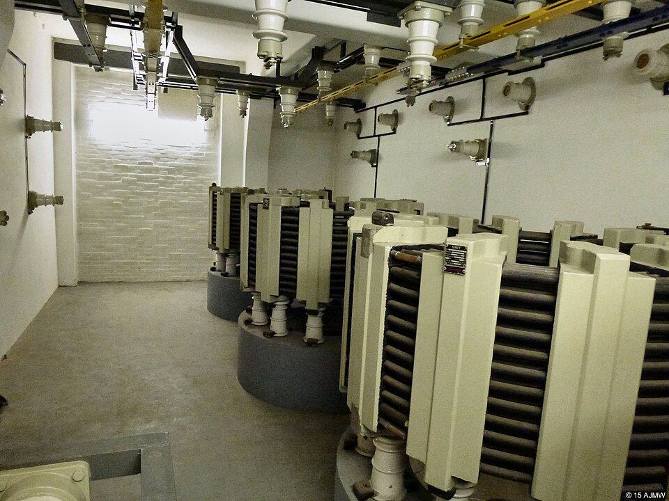 Three large choke coils (one per phase) in a decommissioned substation in Leiden, Netherlands.